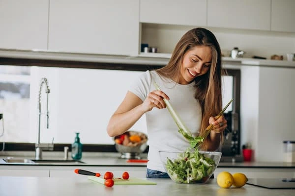 A person preparing a healthy meal